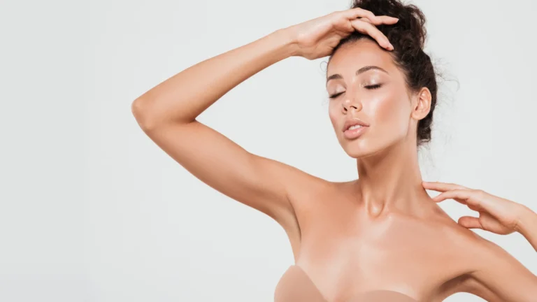 Young woman with glowing skin after aesthetic treatment at Monaz Clinic London