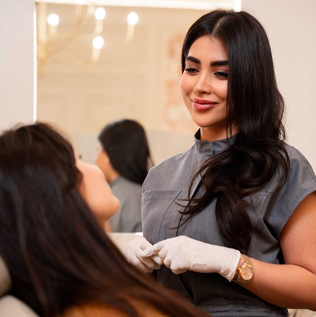 Chin Dimples and Pebbling 1 Aesthetic consultation discussing chin dimples and pebbling concerns before anti-wrinkle injection treatment at Monaz Clinic.