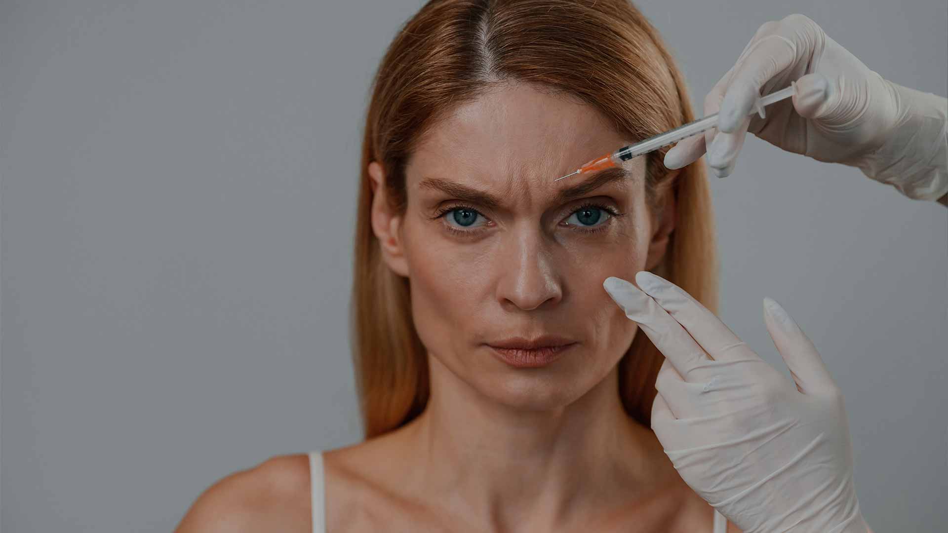 monaz-header-frown-lines-dermal-fillers