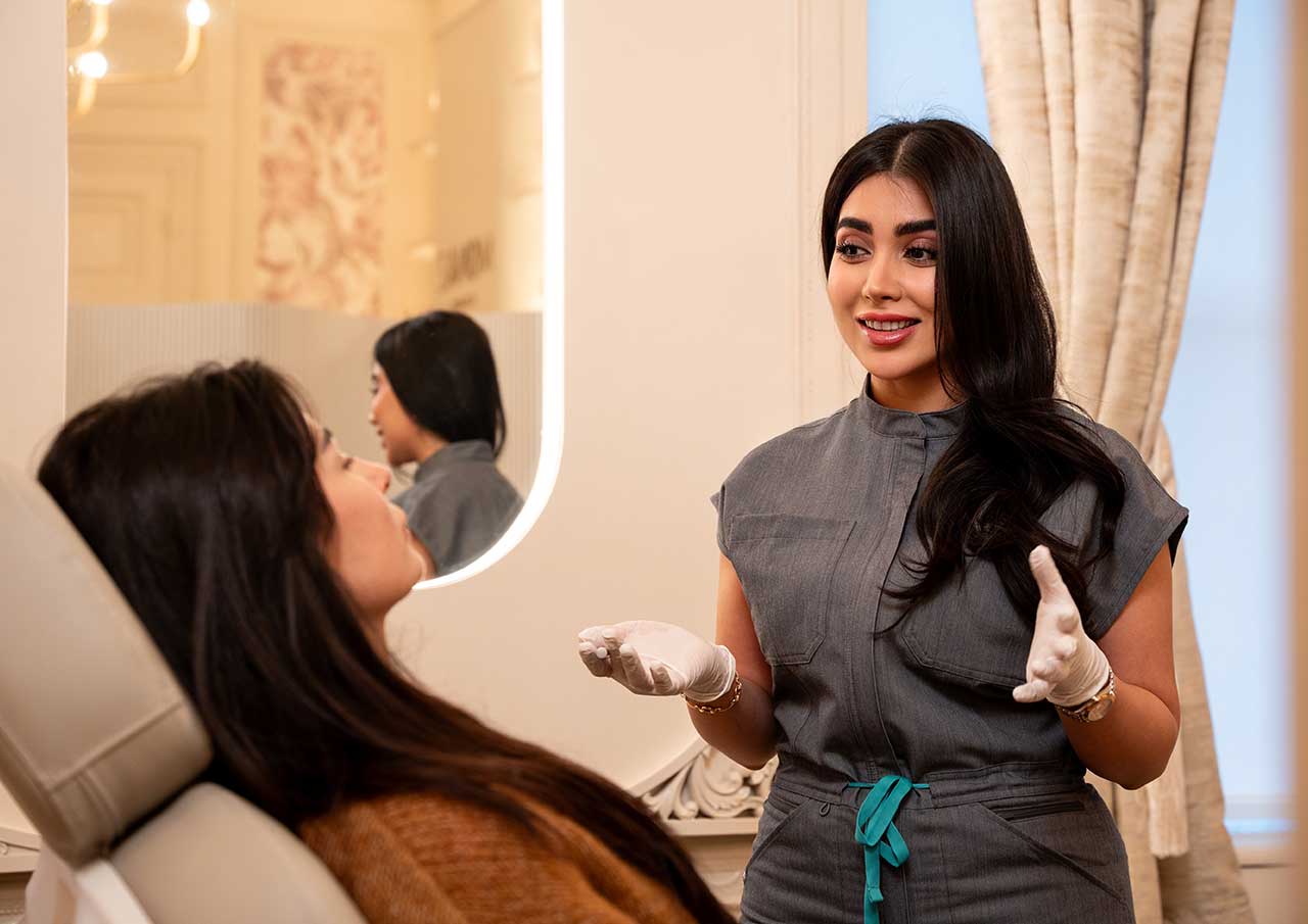 Aesthetic consultation discussing prominent jawline concerns and masseter reduction treatment at Monaz Clinic.